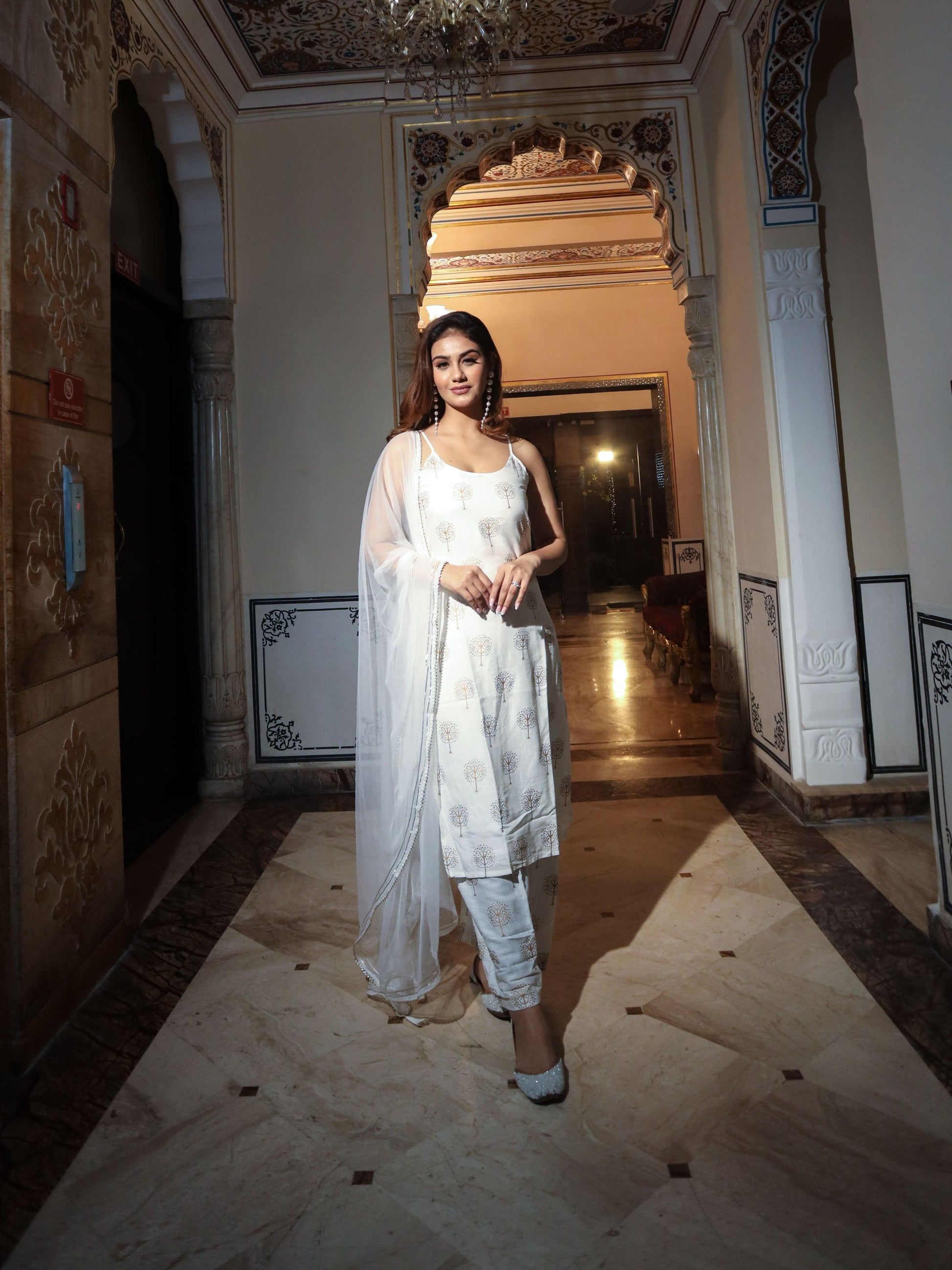 Eshani white shoulder strip Kurta Palazoo set with net Dupatta - divenaworld.com